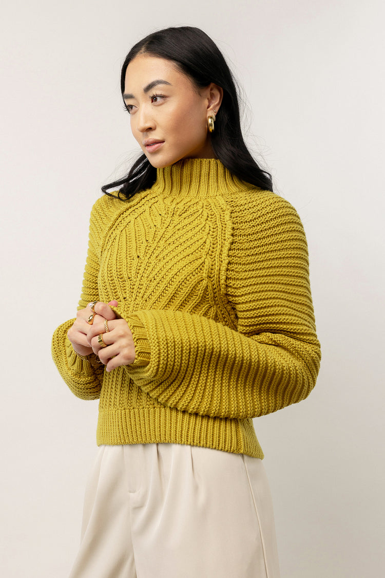 yellow cable knit sweater