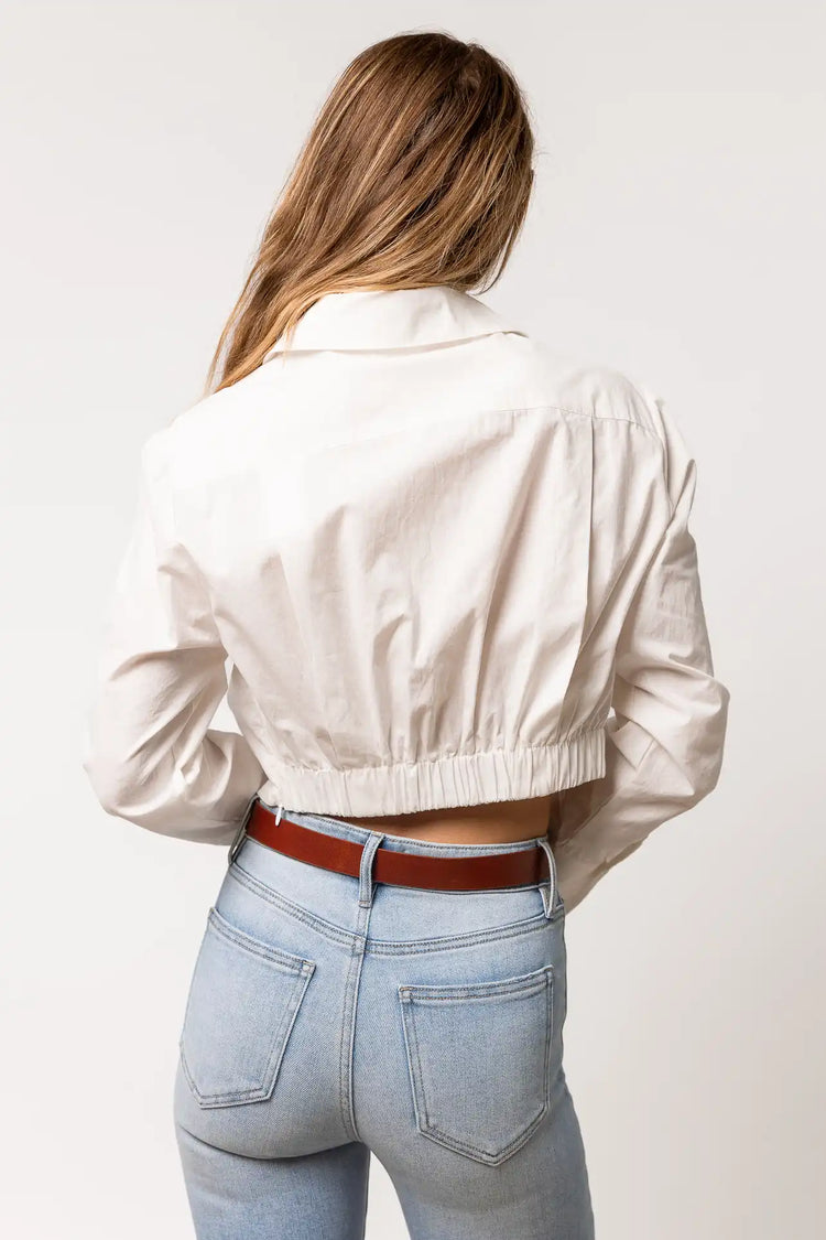 white shirt with elastic detail on hem