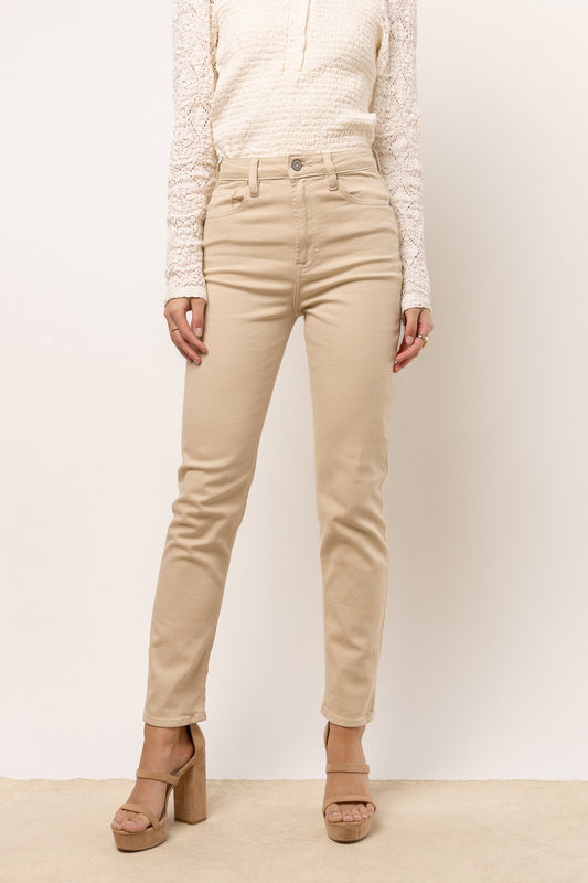 model wearing straight leg pants in the color beige