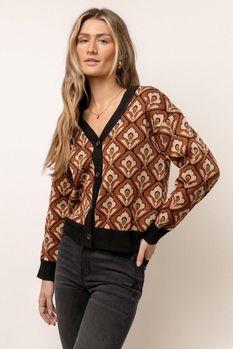 model wearing brown printed sweater cardigan