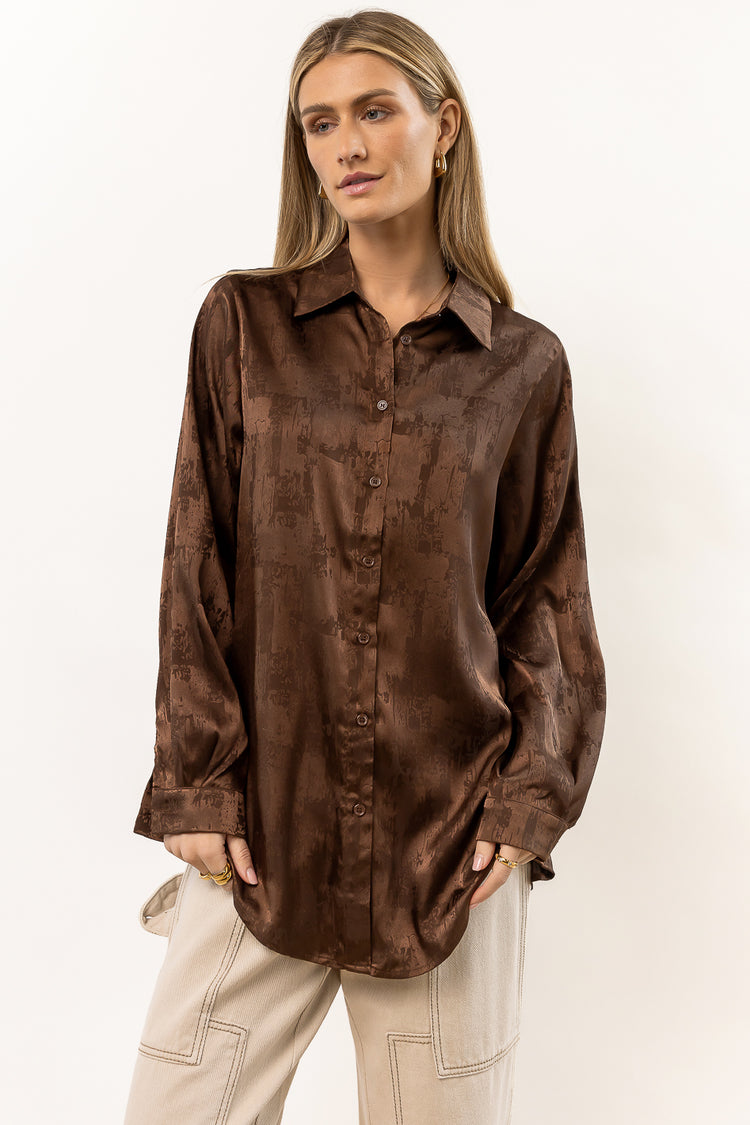 brown satin  button down top with long sleeves