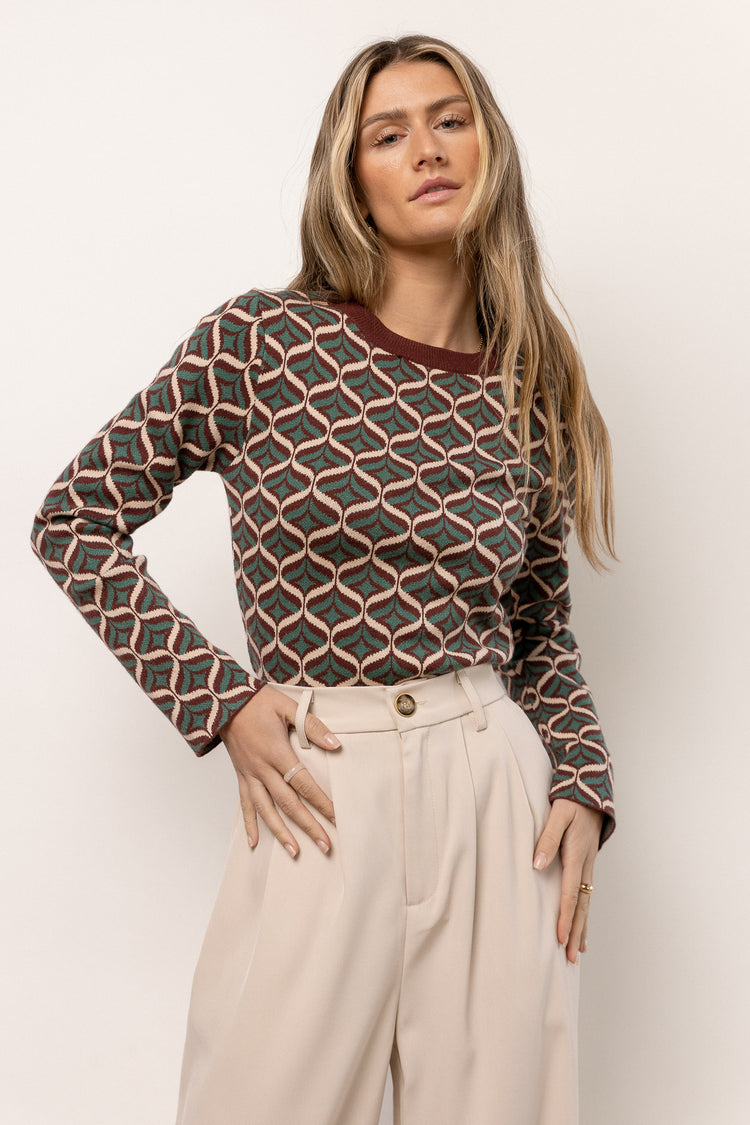 model wearing long sleeve printed sweater 