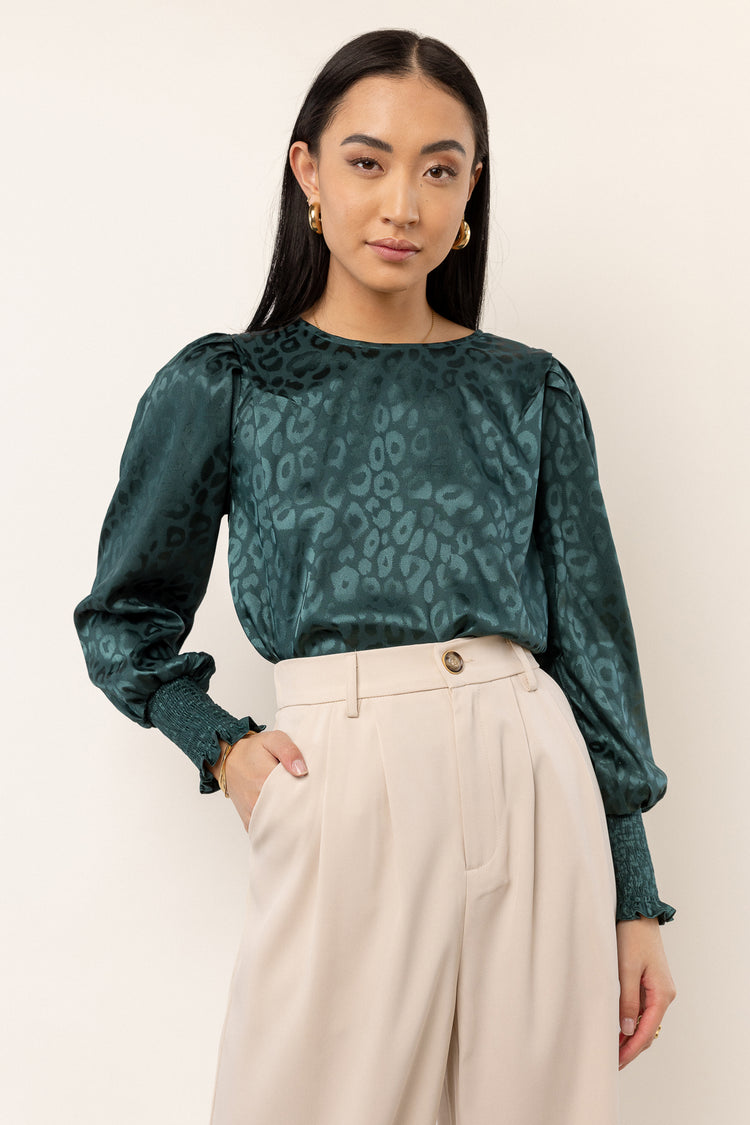 emerald blouse with leopard print