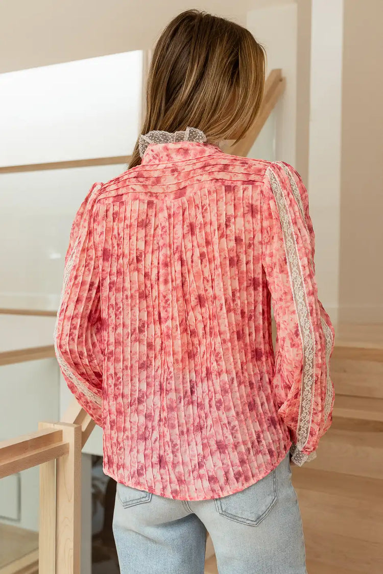 pink long sleeve ruffle blouse