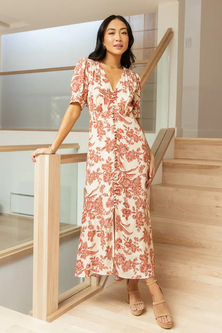 rust floral midi dress with front button detail