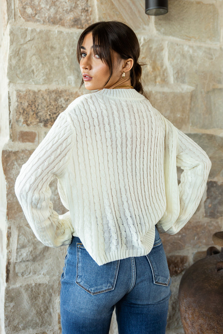 cream colored knit long sleeve
