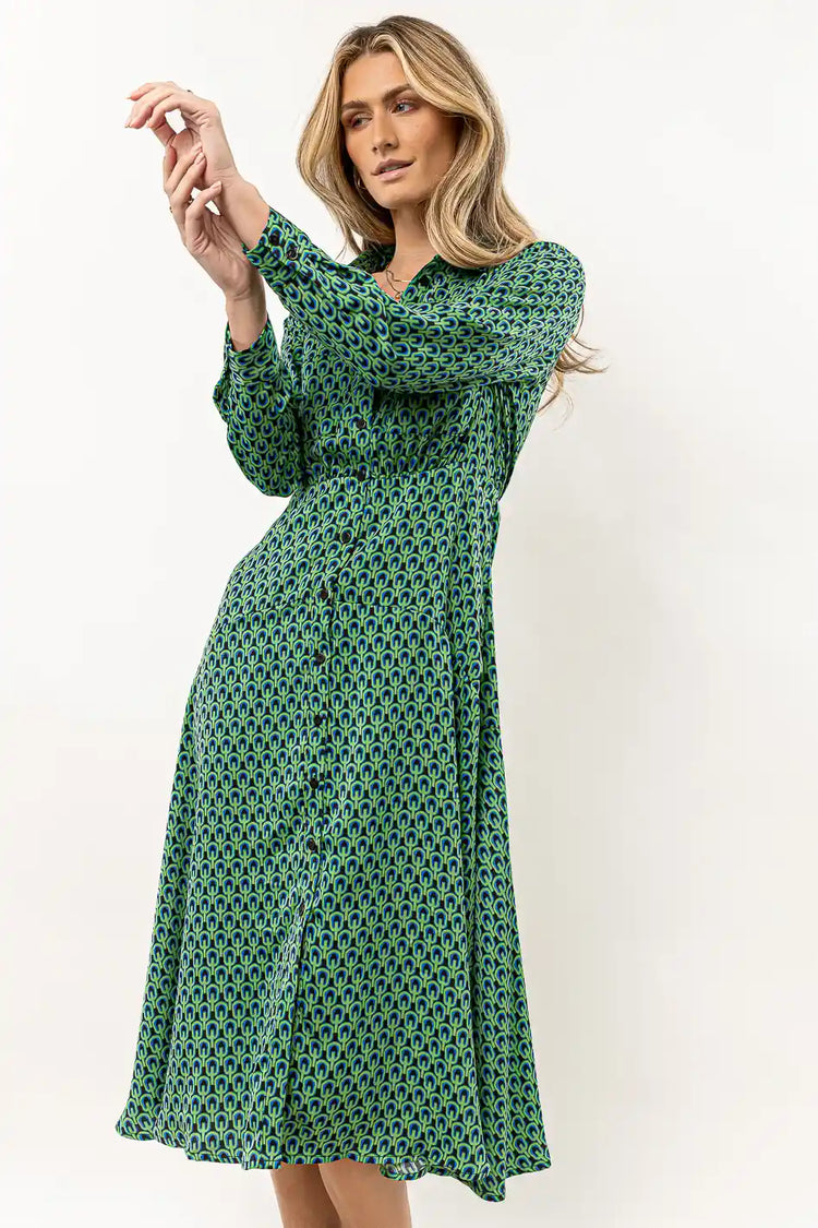 green printed midi dress with long sleeves