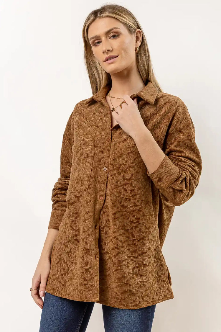 brown button down texture top