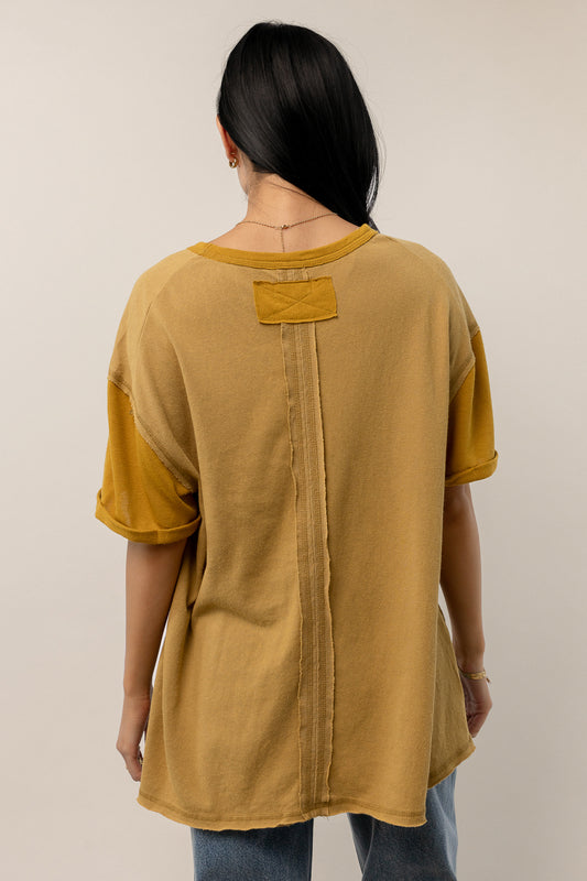mustard colored t-shirt with back seam detail