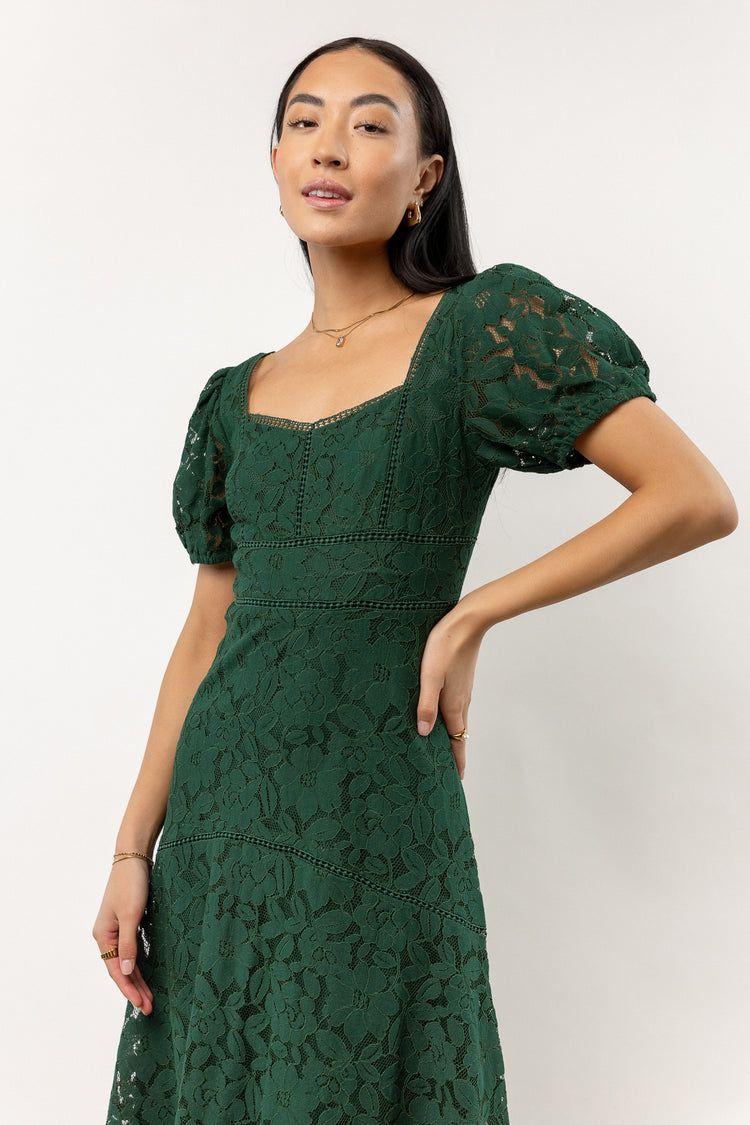 emerald dress with puff sleeves