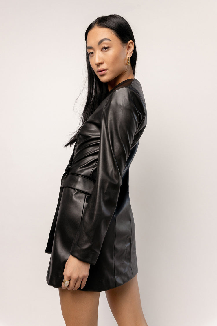 leather dress with shoulder pads