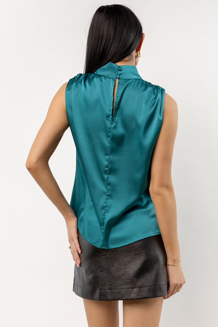 teal top with mock neck