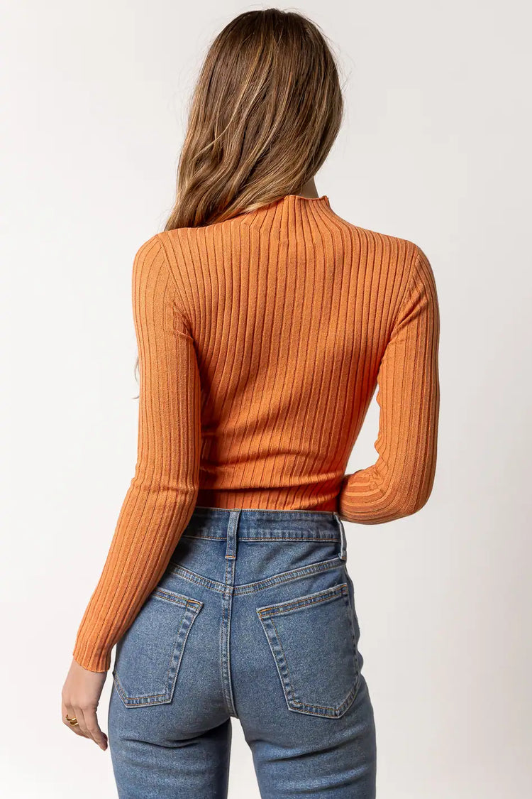 bodysuit in orange with ribbed detail
