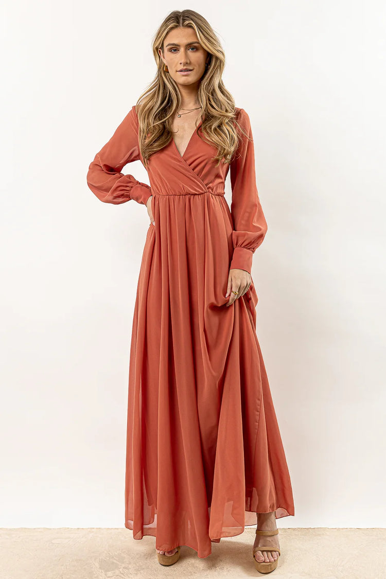 flowy maxi dress with long sleeves in terracotta